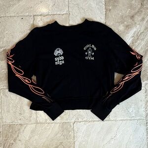 NWOT Darc Sport Cropped Black Gold's Gym Orange Flame Long-Sleeve Tee (Size M)